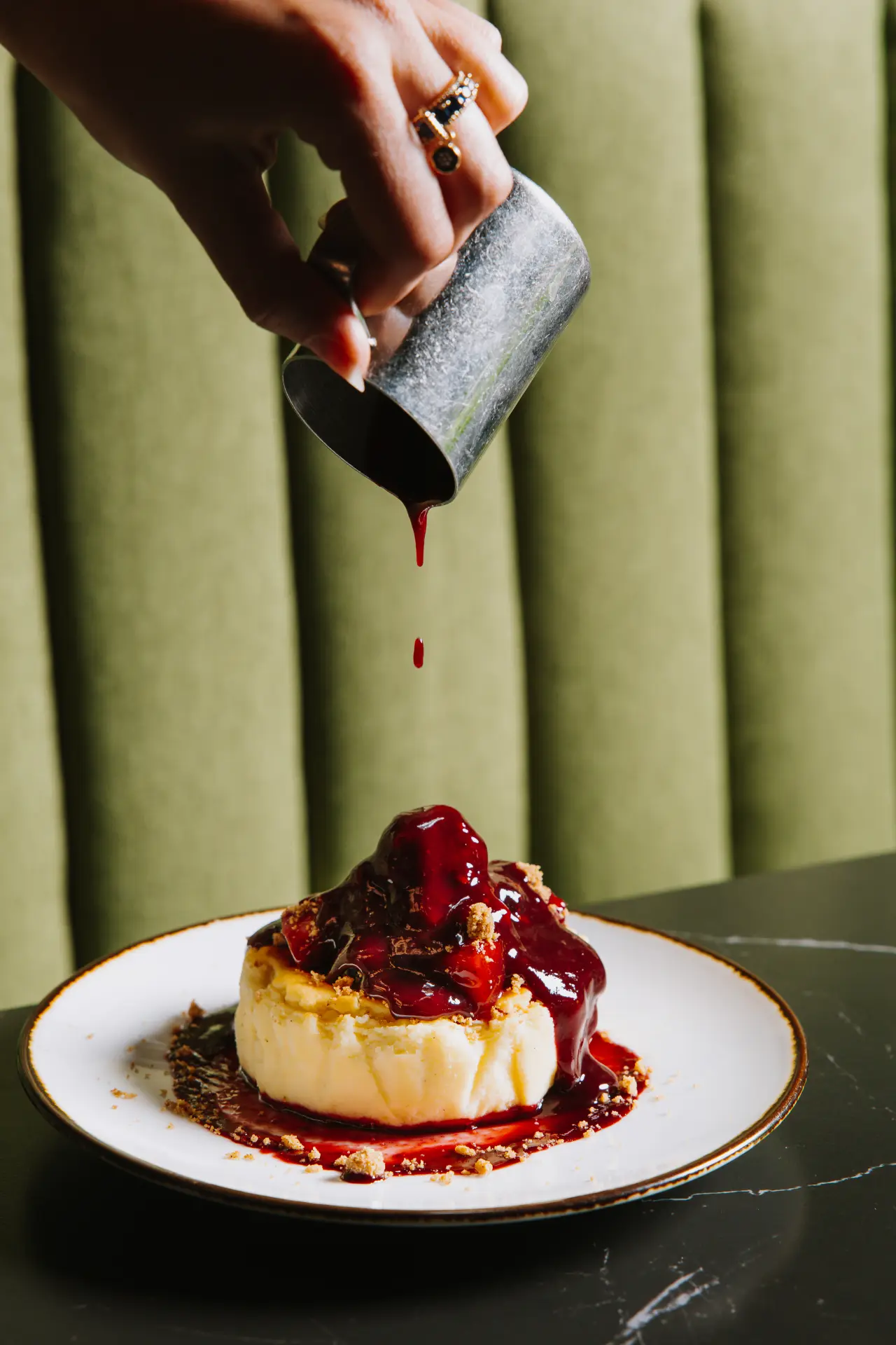 A dessert with a sauce poured at the table