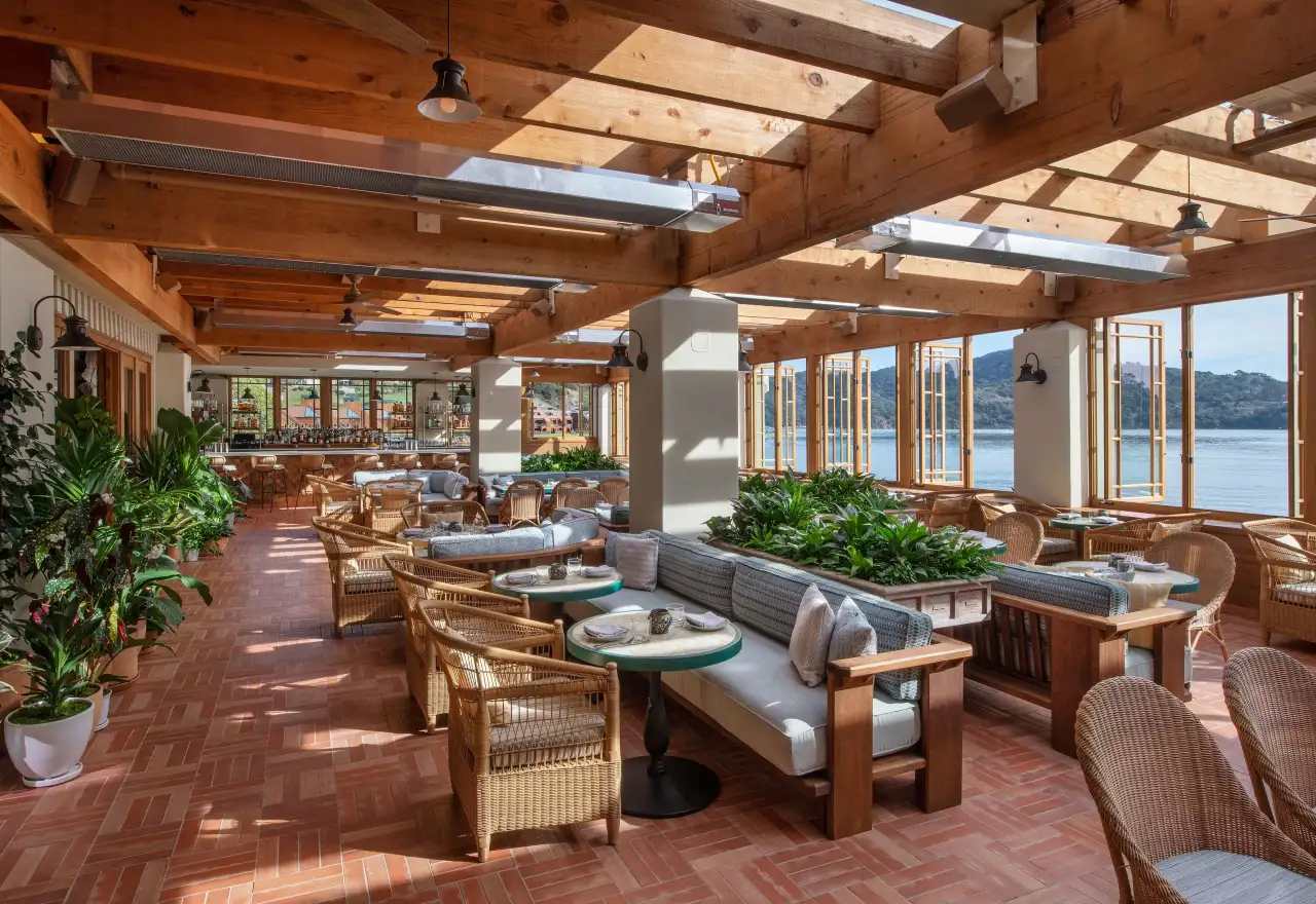 The Sun Room, set for brunch, with windows onto the Bay