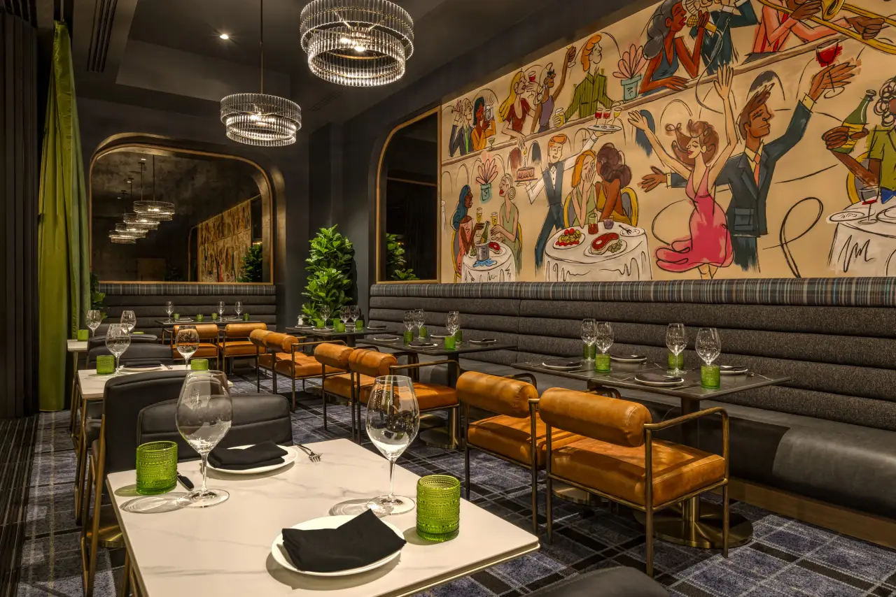 The Americano's dining room with its mural and chandeliers